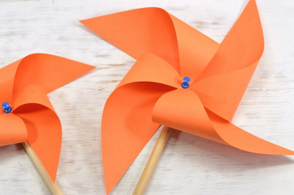 Two orange pinwheels. 